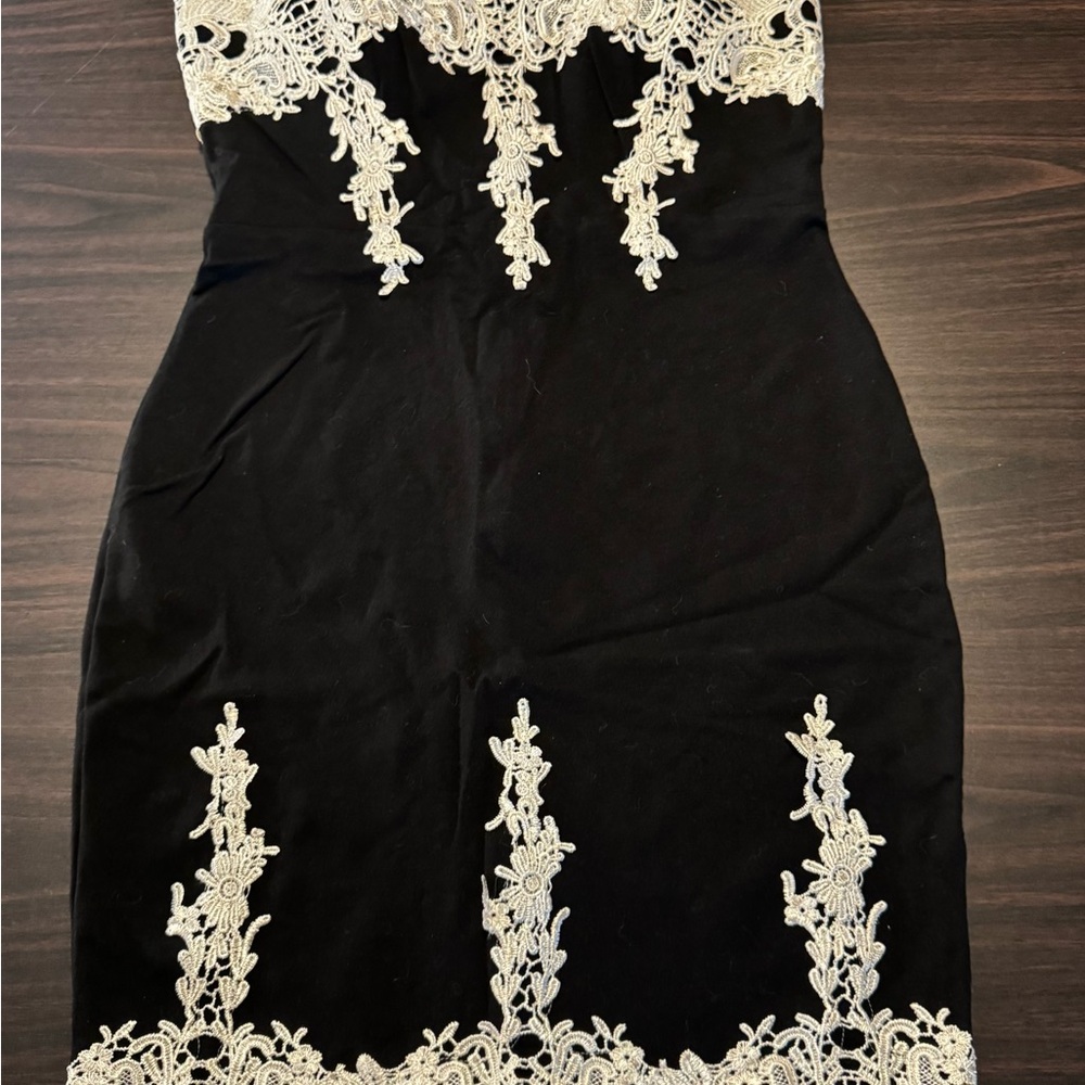 Elegant Black Dress with White Lace Detailing